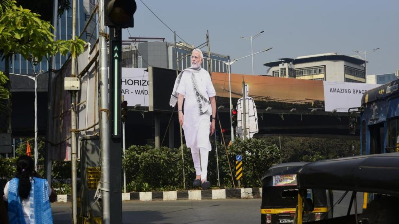 Huge hoarding cutouts  of the Prime Minister, late Balasaheb Thackeray, Maharashtra Chief Minister Eknath Shinde and Deputy Chief Minister Devendra Fadnavis have been put up at Kalanagar. 